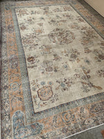 No. 0269 vintage Turkish Anatolian rug with peach and light teal border and floral design Saffron Bloom Interiors 